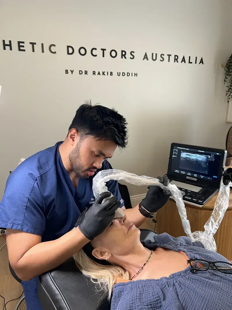 Dr Rakib Uddin treating a patient at Aesthetic Doctors Australia, Kew, Melbourne